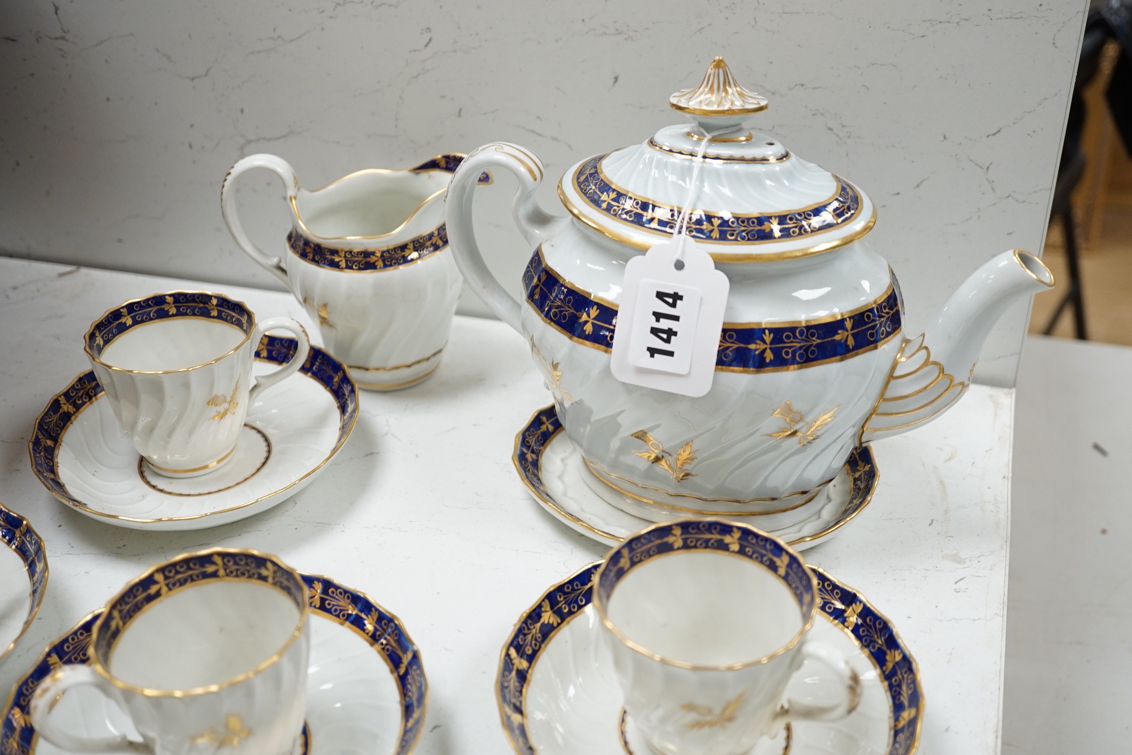 A Flight and Barr, Worcester blue and gilt bordered part tea and coffee service, c.1795, incised B marks